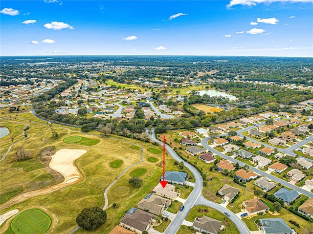 birds eye view of property featuring a water view, a residential view, and golf course view