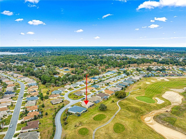 drone / aerial view featuring a residential view and golf course view