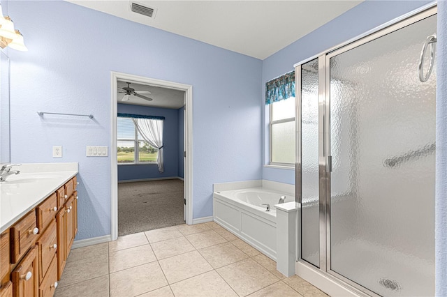 full bath featuring a garden tub, tile patterned flooring, vanity, visible vents, and a stall shower