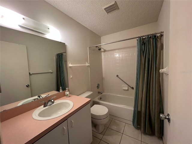 full bathroom with vanity, shower / bath combination with curtain, a textured ceiling, and toilet