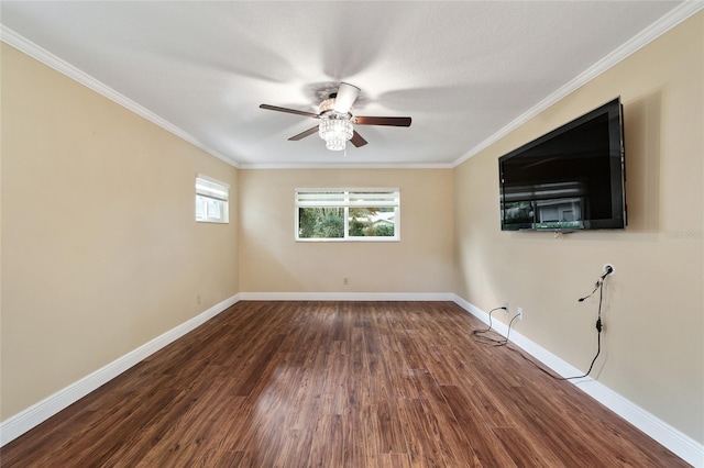 spare room with wood-type flooring, ceiling fan, and crown molding