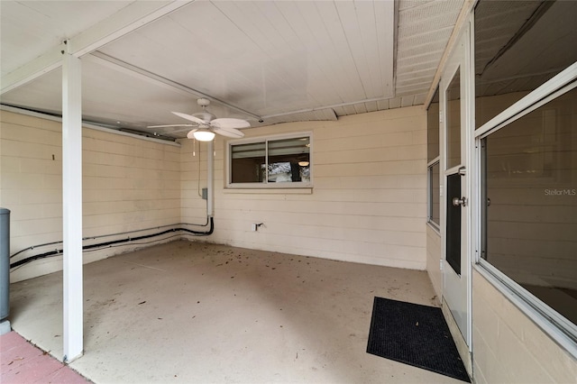 exterior space featuring ceiling fan