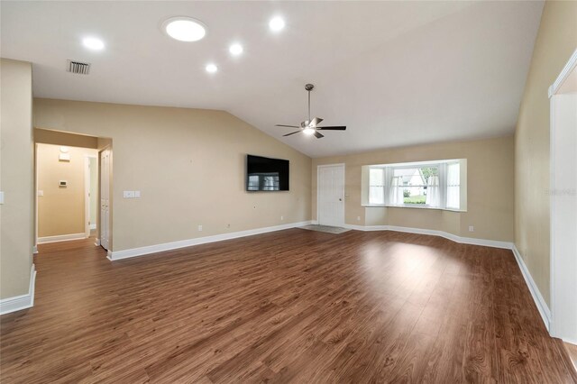 unfurnished living room with ceiling fan, lofted ceiling, and dark hardwood / wood-style floors