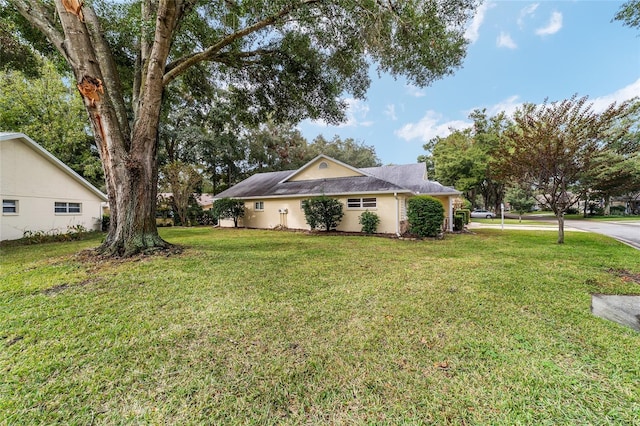 view of front of home with a front yard