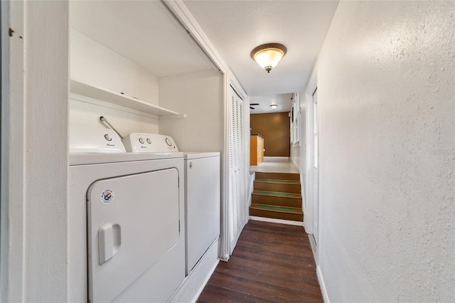 washroom featuring washer and clothes dryer and dark hardwood / wood-style floors