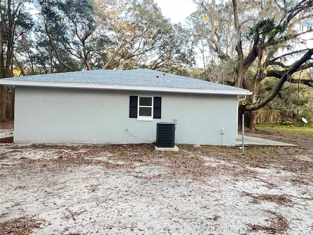 view of home's exterior featuring cooling unit