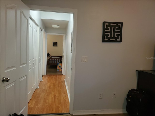 hall featuring light hardwood / wood-style floors