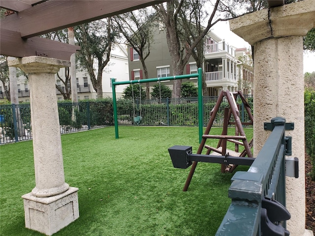 view of playground with a yard