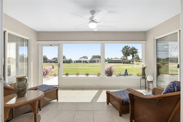 15596 SW 13th Cir, Ocala, FL 34473 - sunroom featuring ceiling fan, plenty of natural light, and tile patterned floors