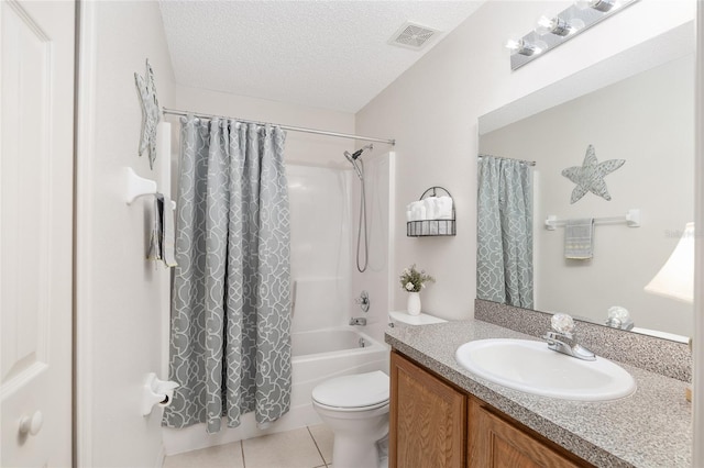 full bathroom with toilet, tile patterned floors, a textured ceiling, vanity, and shower / bath combination with curtain