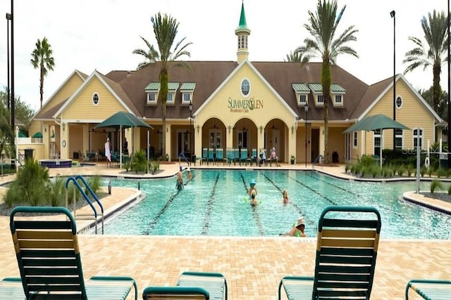 view of swimming pool featuring a patio