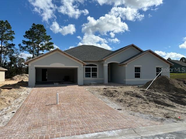 view of front of home featuring a garage