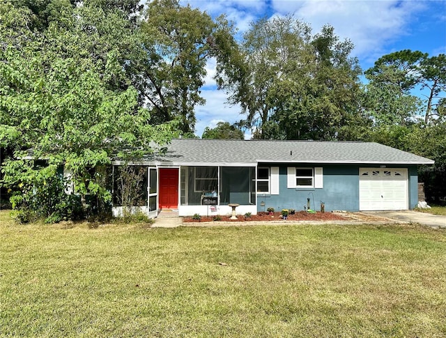 single story home with a garage and a front yard