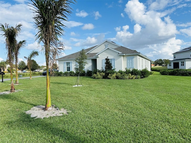 view of front of property with a front lawn