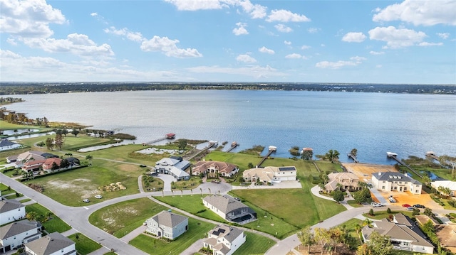 bird's eye view with a water view