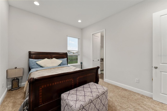 bedroom with light carpet