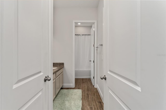 bathroom with vanity and hardwood / wood-style floors