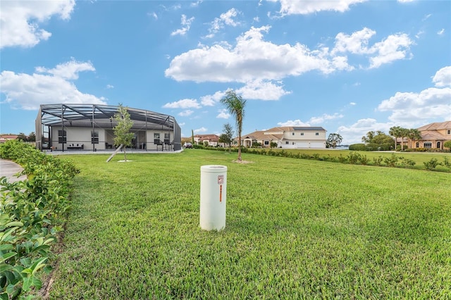 view of yard featuring a lanai