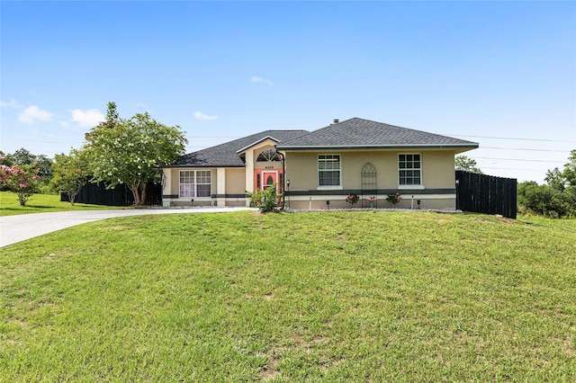 ranch-style house featuring a front lawn