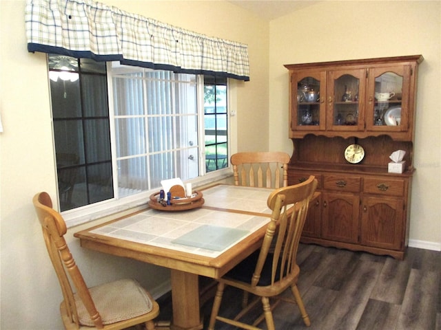 dining area featuring dark hardwood / wood-style floors