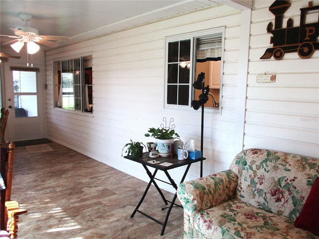 exterior space featuring ceiling fan