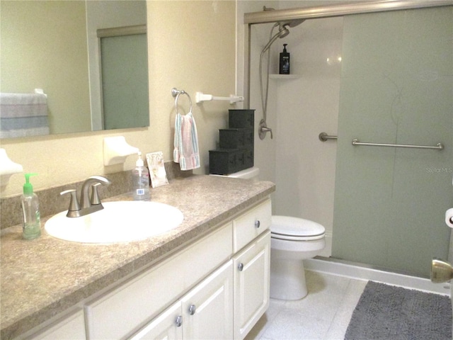 bathroom with toilet, tile patterned floors, vanity, and a shower with door