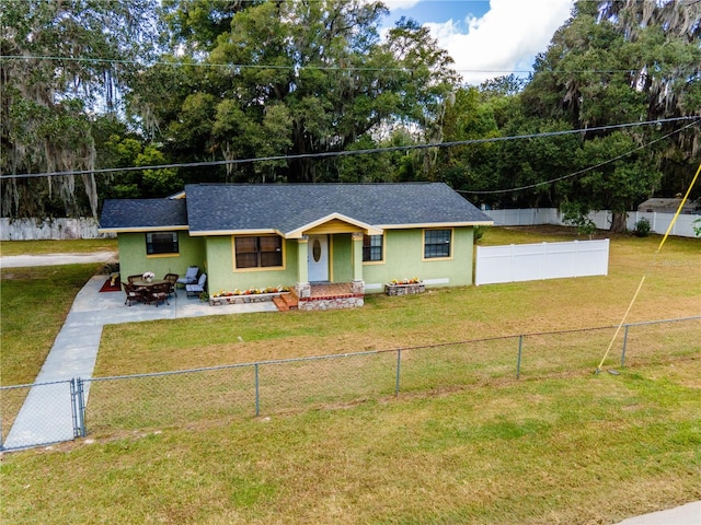 ranch-style house with a front lawn