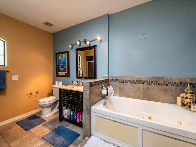 bathroom featuring a textured ceiling, a washtub, toilet, tile patterned floors, and vanity