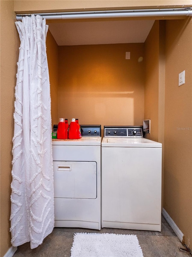 washroom with washer and clothes dryer