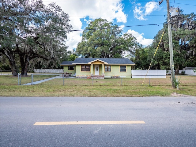 single story home with a front yard