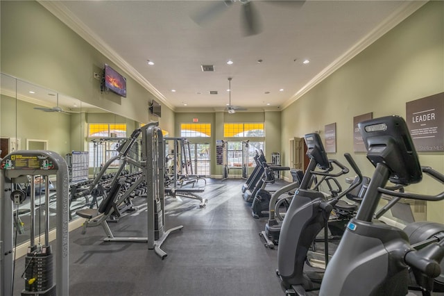 gym featuring ceiling fan and crown molding