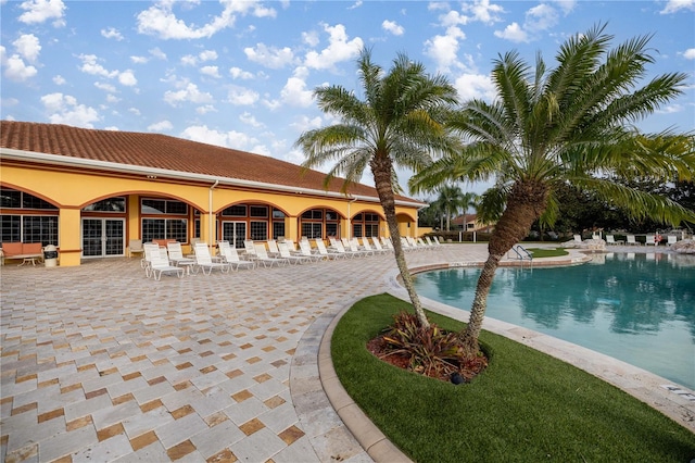 view of pool featuring a patio