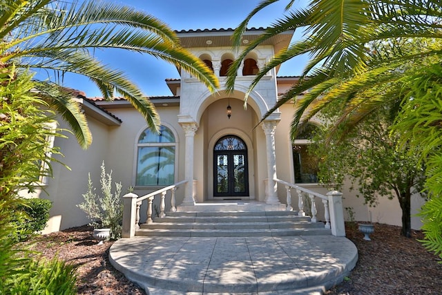 doorway to property featuring french doors