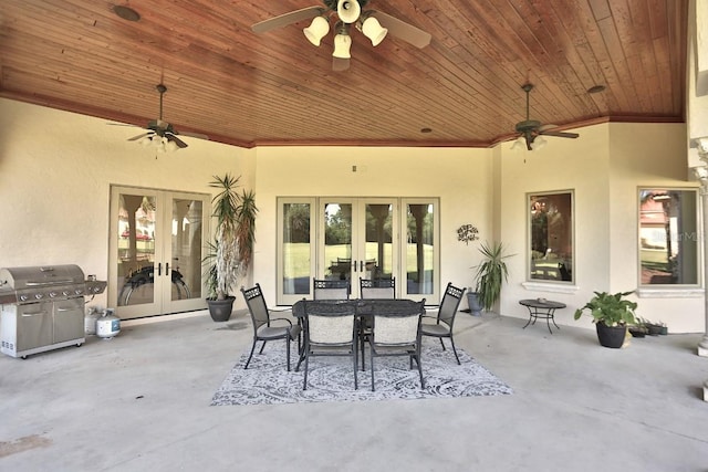 view of patio with french doors, ceiling fan, and a grill