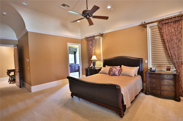 carpeted bedroom featuring lofted ceiling, ceiling fan, and crown molding