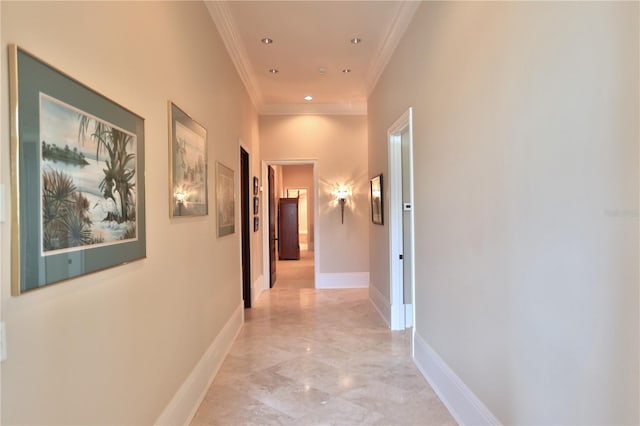 hallway featuring crown molding