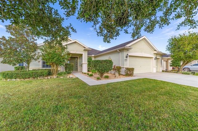 ranch-style home with a garage and a front lawn