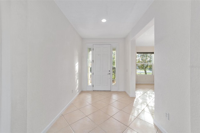 foyer entrance featuring light tile patterned floors