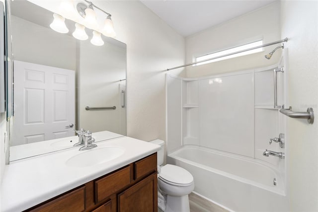 full bathroom featuring hardwood / wood-style floors, vanity, toilet, and shower / bathtub combination