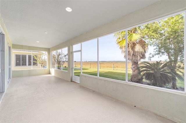 unfurnished sunroom with a healthy amount of sunlight