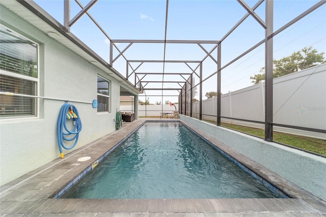 view of pool featuring a patio and a lanai