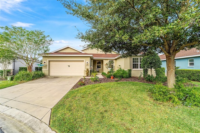 single story home featuring a front yard and a garage