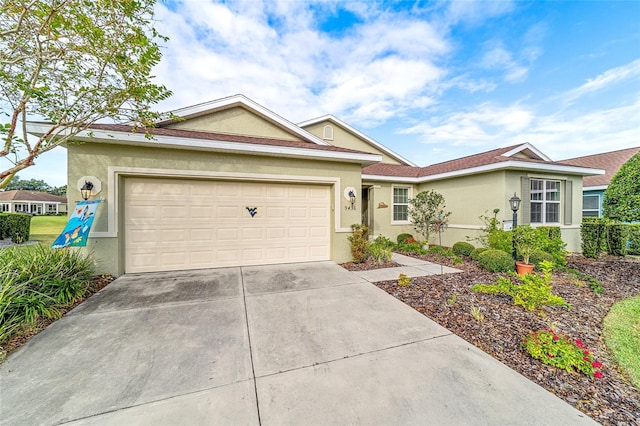 single story home featuring a garage