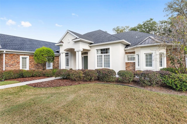 view of front of property with a front lawn