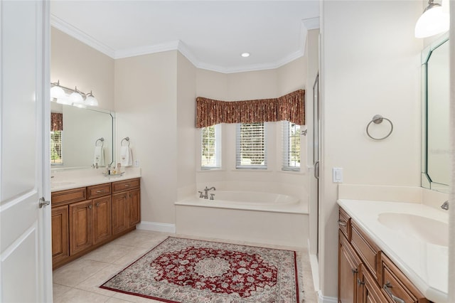 bathroom with ornamental molding, vanity, a tub to relax in, and tile patterned floors