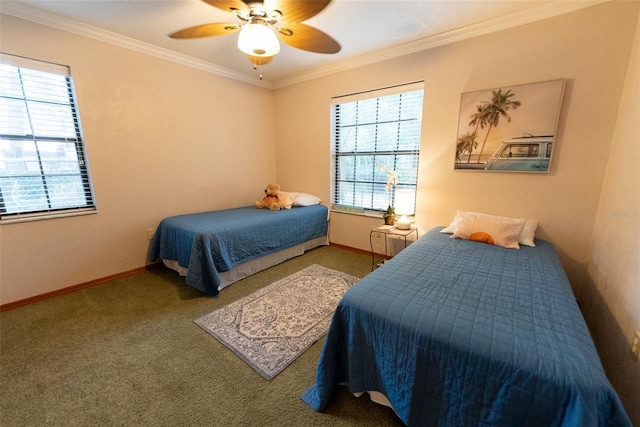 carpeted bedroom with ornamental molding and ceiling fan