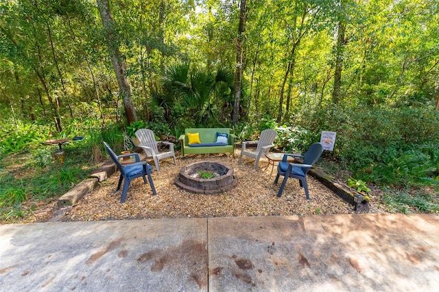 view of patio / terrace with a fire pit