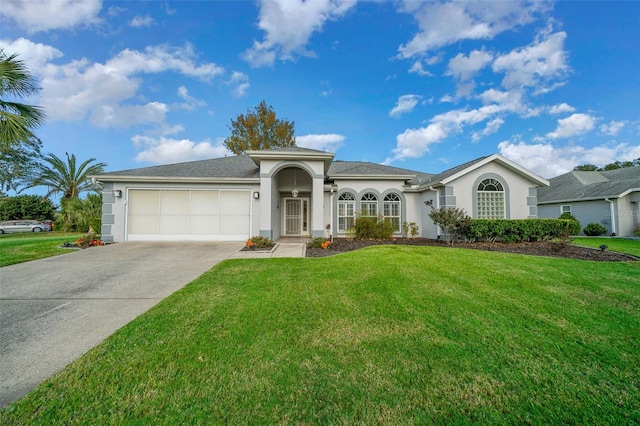 ranch-style house with a front lawn and a garage