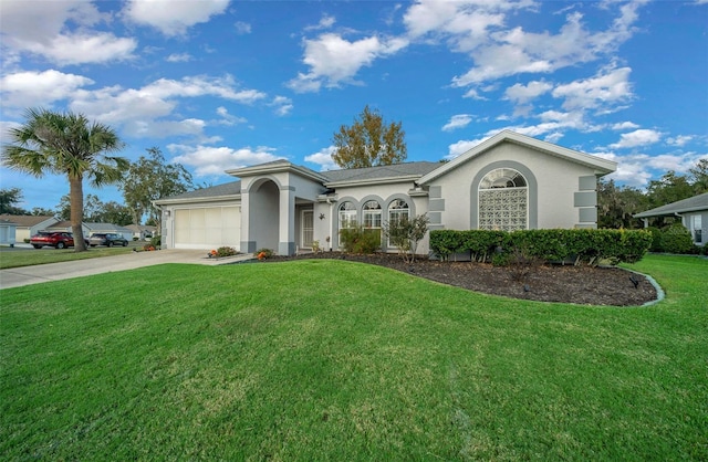 ranch-style home with a garage and a front yard