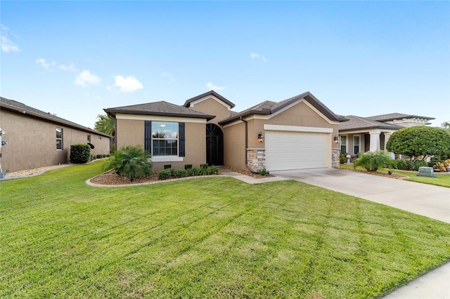 view of front of house with a garage and a front yard